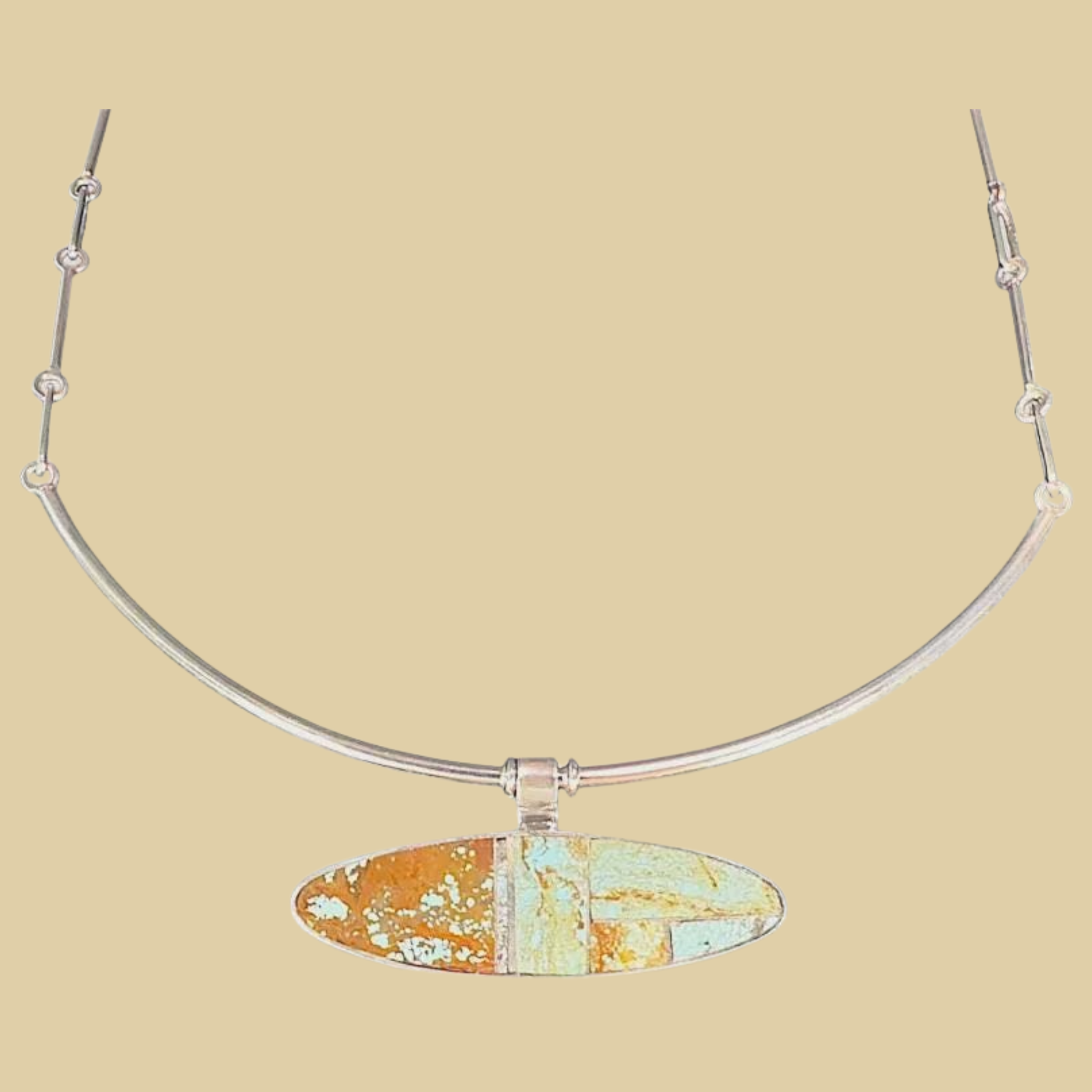 Turquoise Inlay Collar Necklace in Navajo Sterling Silver, by Harold Smith, shown on a desert plaster background