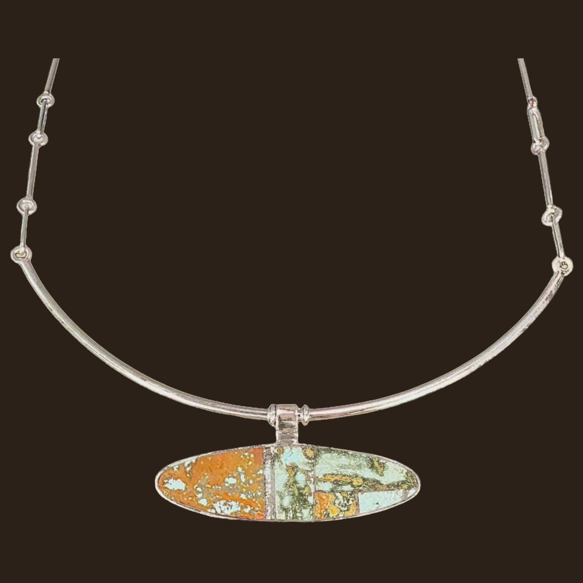 Turquoise Inlay Collar Necklace in Navajo Sterling Silver, by Harold Smith, shown on an espresso background