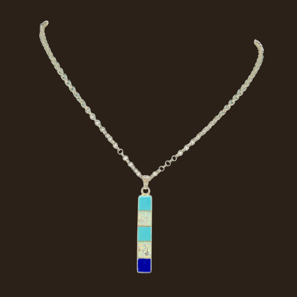 Turquoise, Opal and Lapis Necklace in Sterling Silver, by Rick Tolino, shown on an espresso background