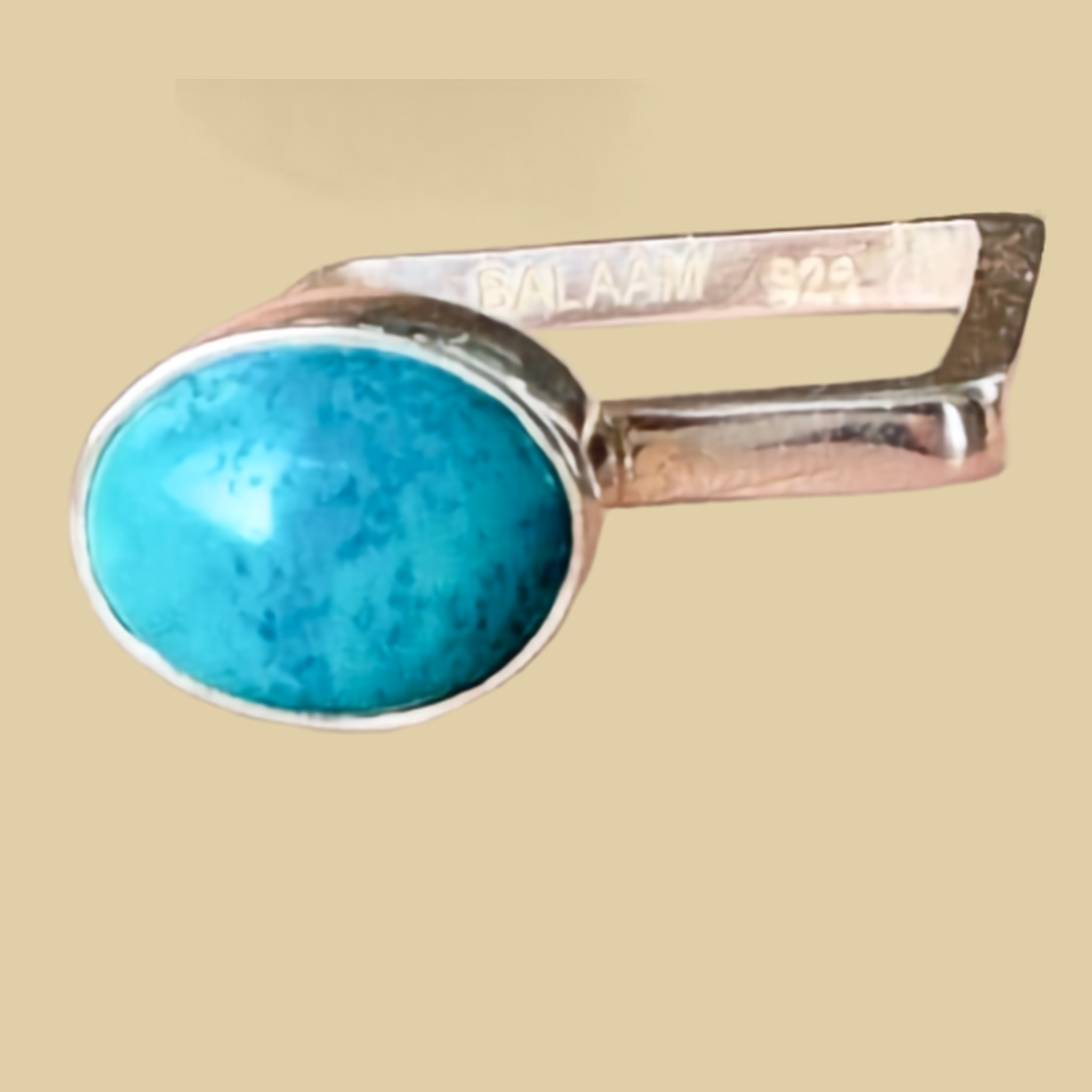 Turquoise Square Band Ring in Sterling Silver, by BALAAM, Size 5.5, shown on a desert plaster background