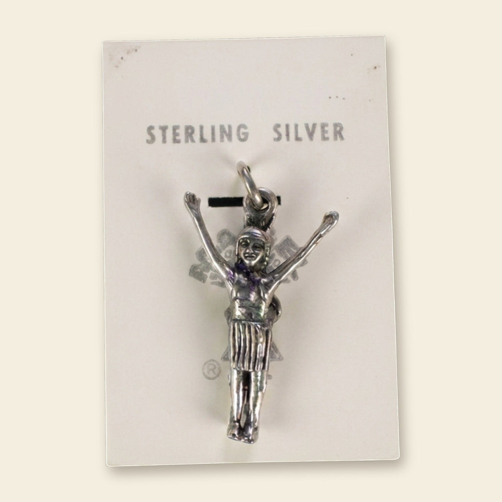 Vintage Maisel's Sterling Silver Figure with Arms Raised Charm, New Old Stock, shown on an ivory background