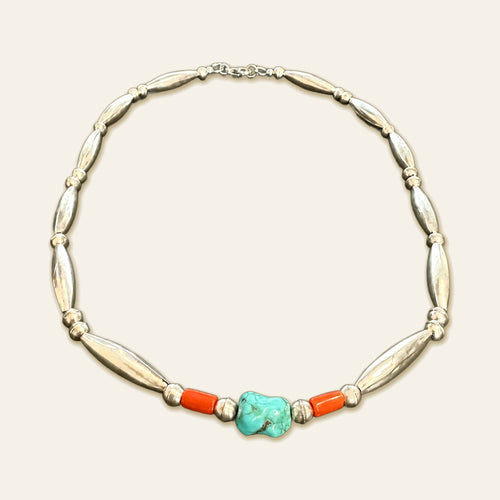 Vintage Turquoise Nugget and Coral Necklace in Sterling Silver, 18 Inch, shown on a cream background