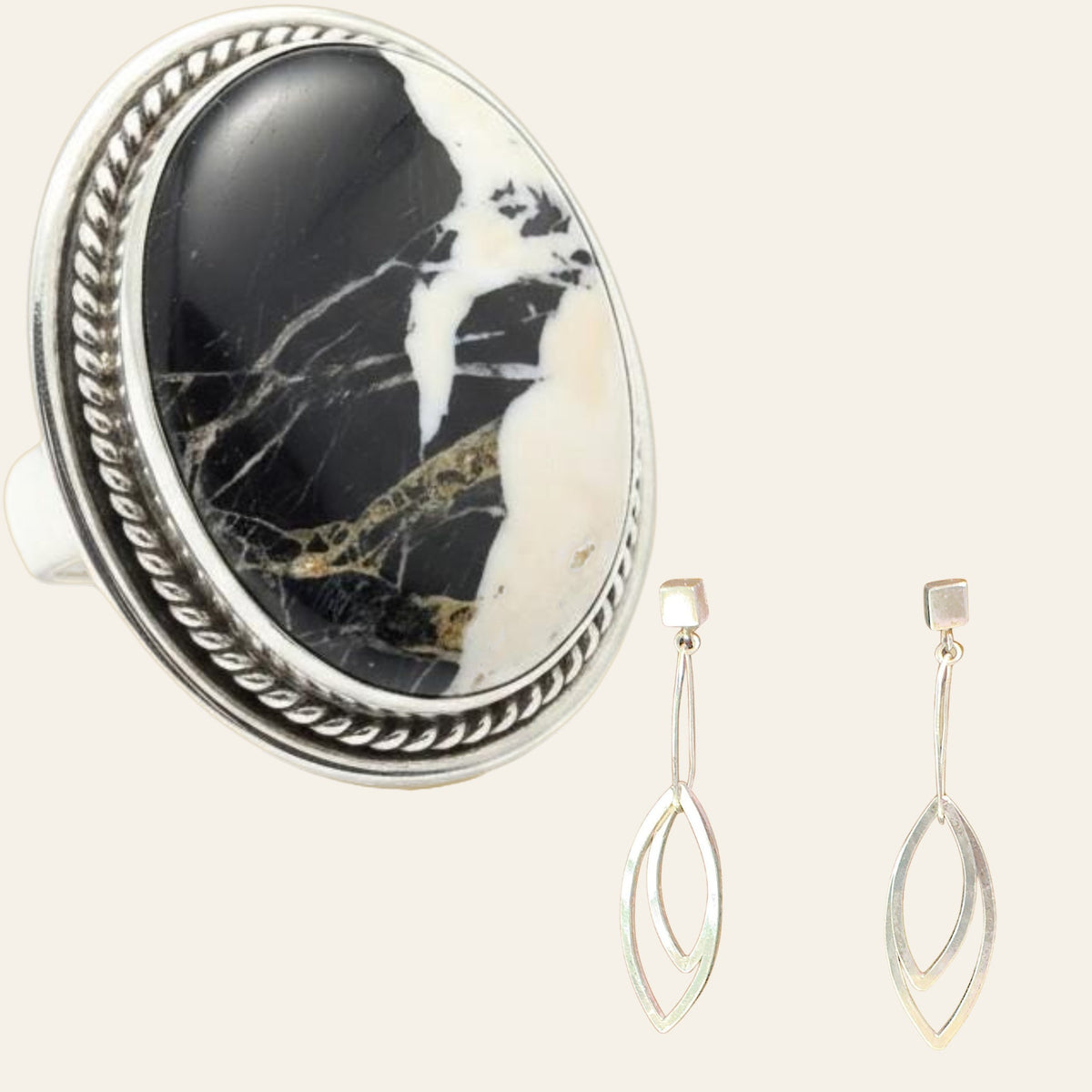 White Buffalo Ring and Leaf Earrings Set in Sterling Silver, Size 8, shown on a cream background