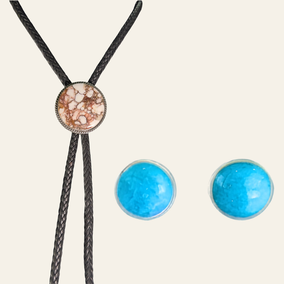 Wild Horse Bolo Tie and Turquoise Stud Earrings Set in Sterling Silver, shown on a cream background