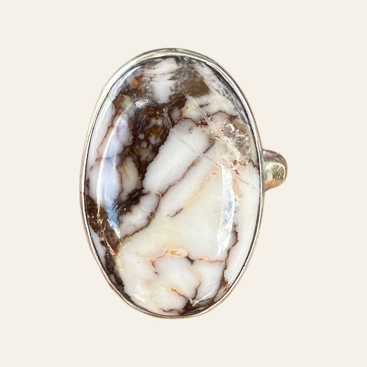 Wild Horse Stone Ring in Sterling Silver, Size 7, shown on a cream background