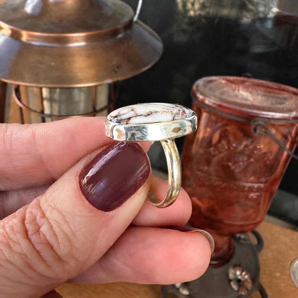 Side profile of the Wild Horse stone ring showing the sterling silver bezel setting and band