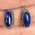 Wildflower Artisans oval lapis lazuli earrings in sterling silver with a handcrafted twisted rope and sawtooth bezel.