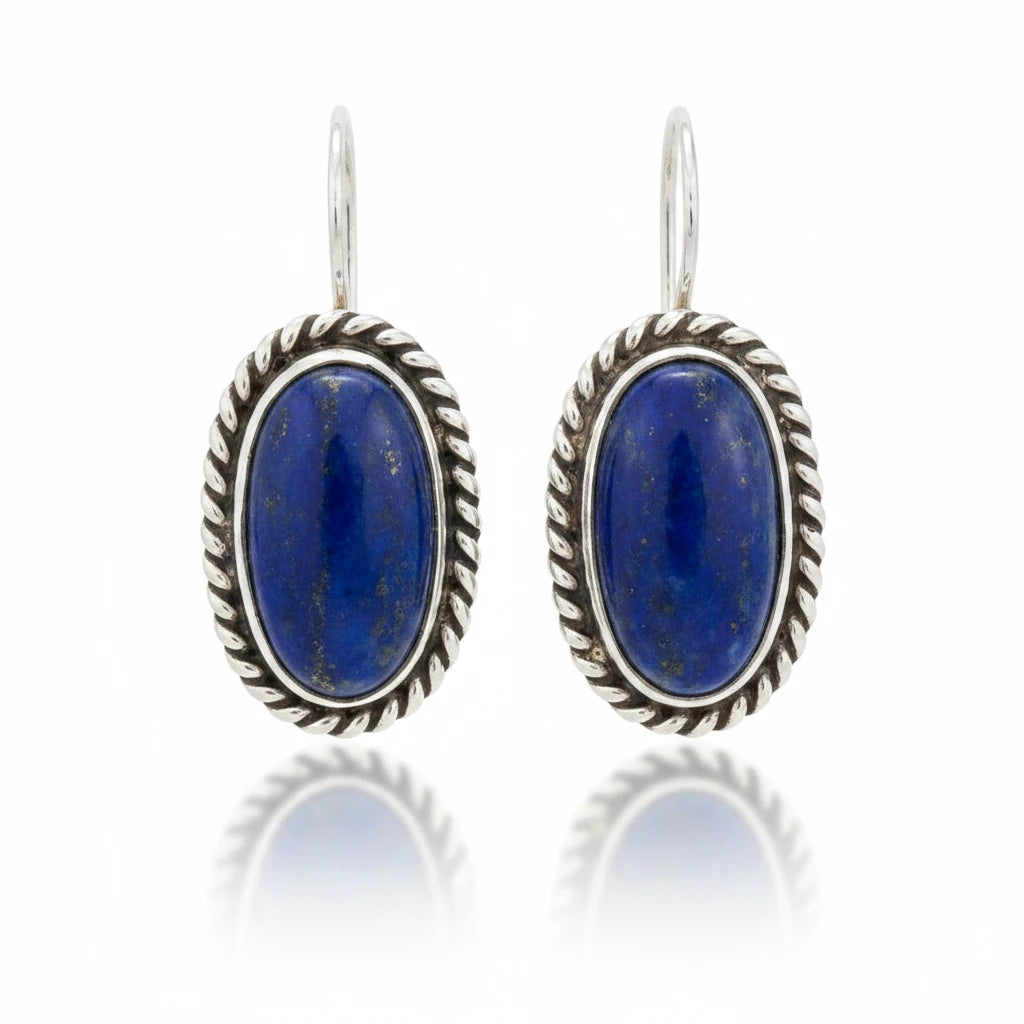 Wildflower Artisans oval lapis lazuli earrings in sterling silver with a handcrafted twisted rope bezel and wire hooks.