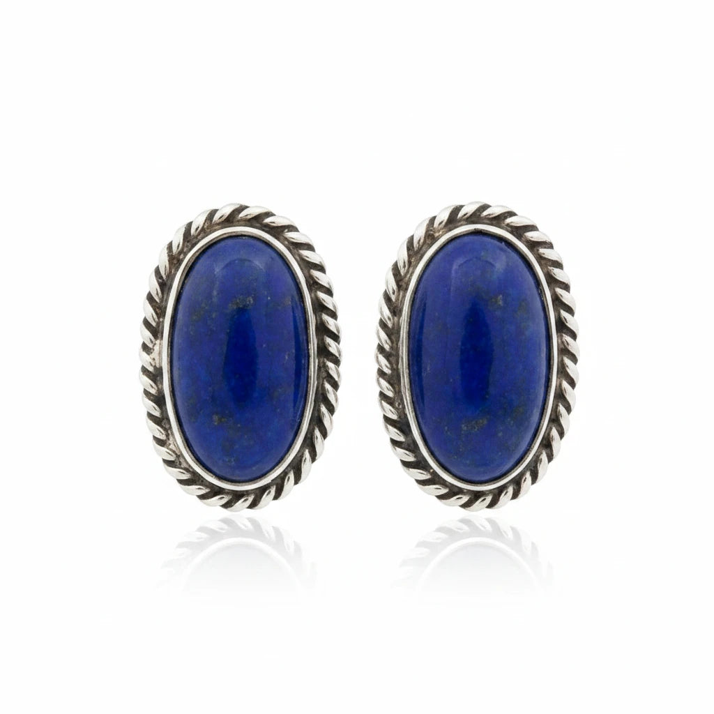 Wildflower Artisans oval lapis lazuli earrings featuring deep blue stones with pyrite in sterling silver rope bezels