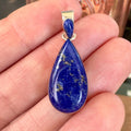 Wildflower Artisans teardrop lapis lazuli pendant with gold pyrite inclusions set in polished sterling silver