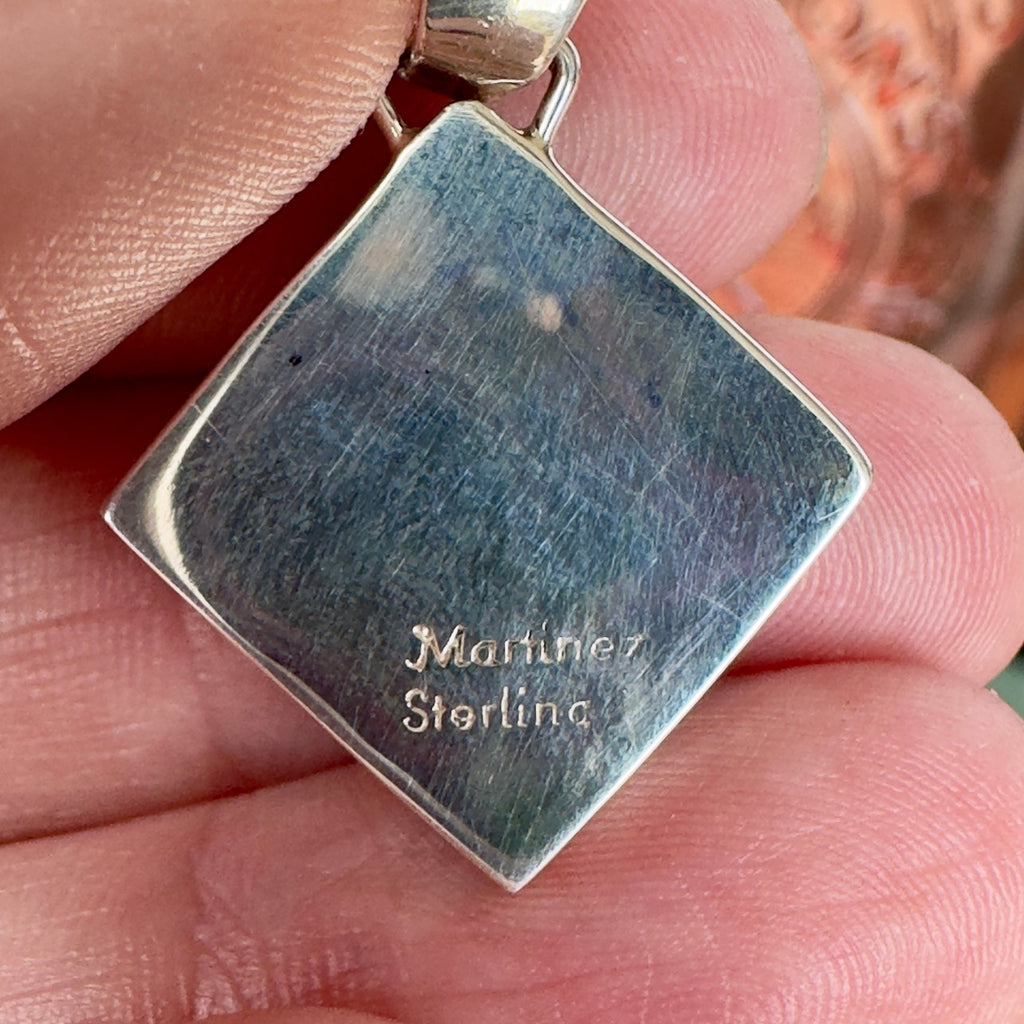 Wildflower Artisans sterling silver pendant back showing Martinez and sterling hallmark on a square setting