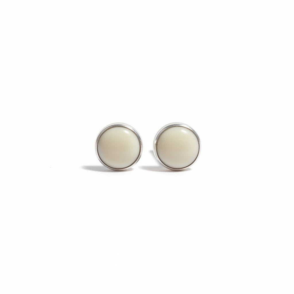 Wildflower Artisans round mother of pearl stud earrings set in polished .925 sterling silver bezels.