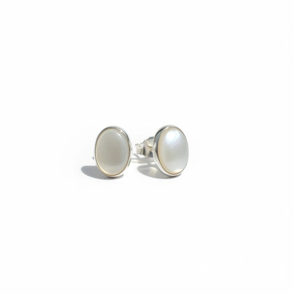Wildflower Artisans oval opal stud earrings hand-set in polished .925 sterling silver bezels on a white background.