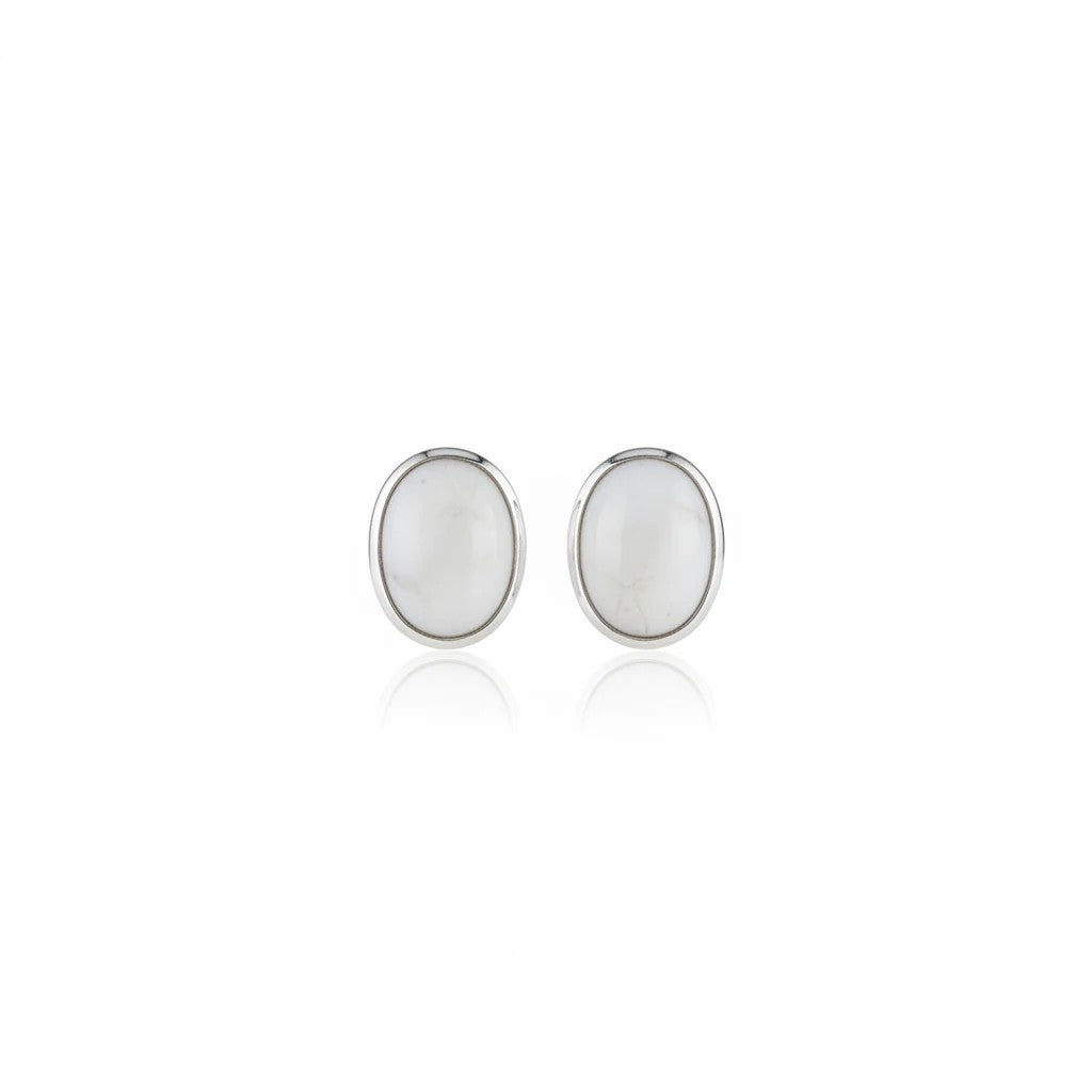 Wildflower Artisans oval white stone stud earrings set in polished sterling silver with a minimalist design.