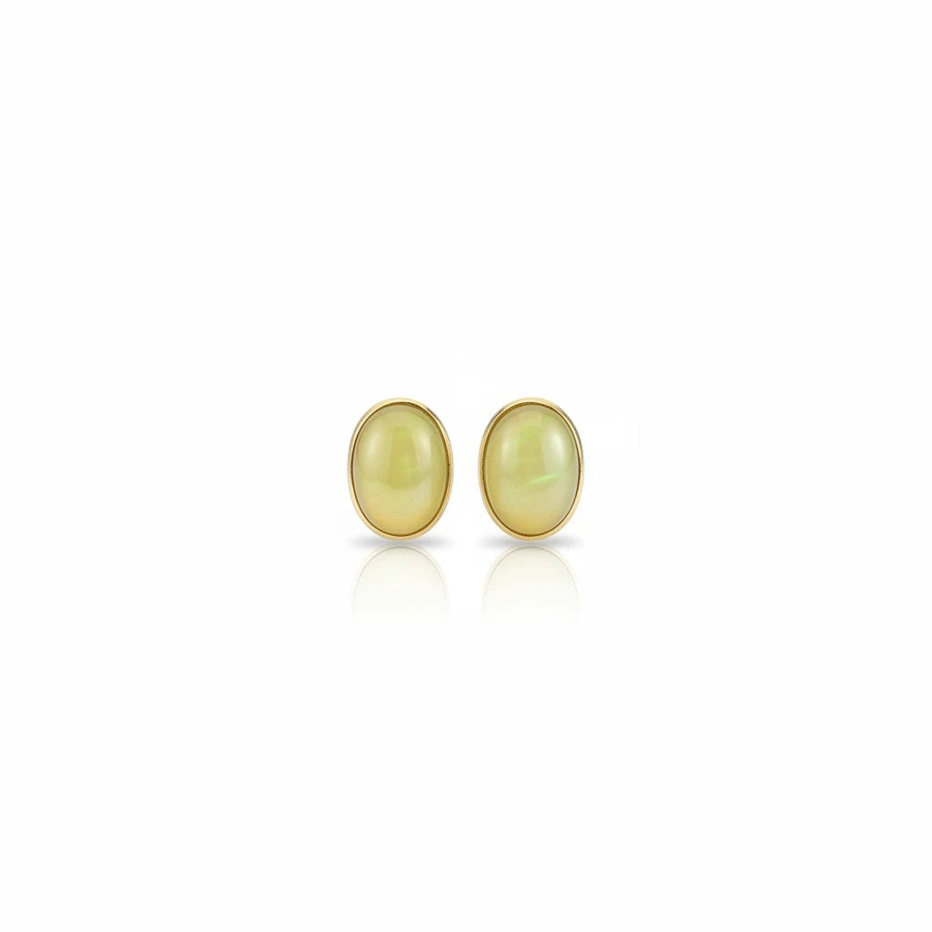 Wildflower Artisans oval yellow opal stud earrings set in 14K gold with a warm honey glow.