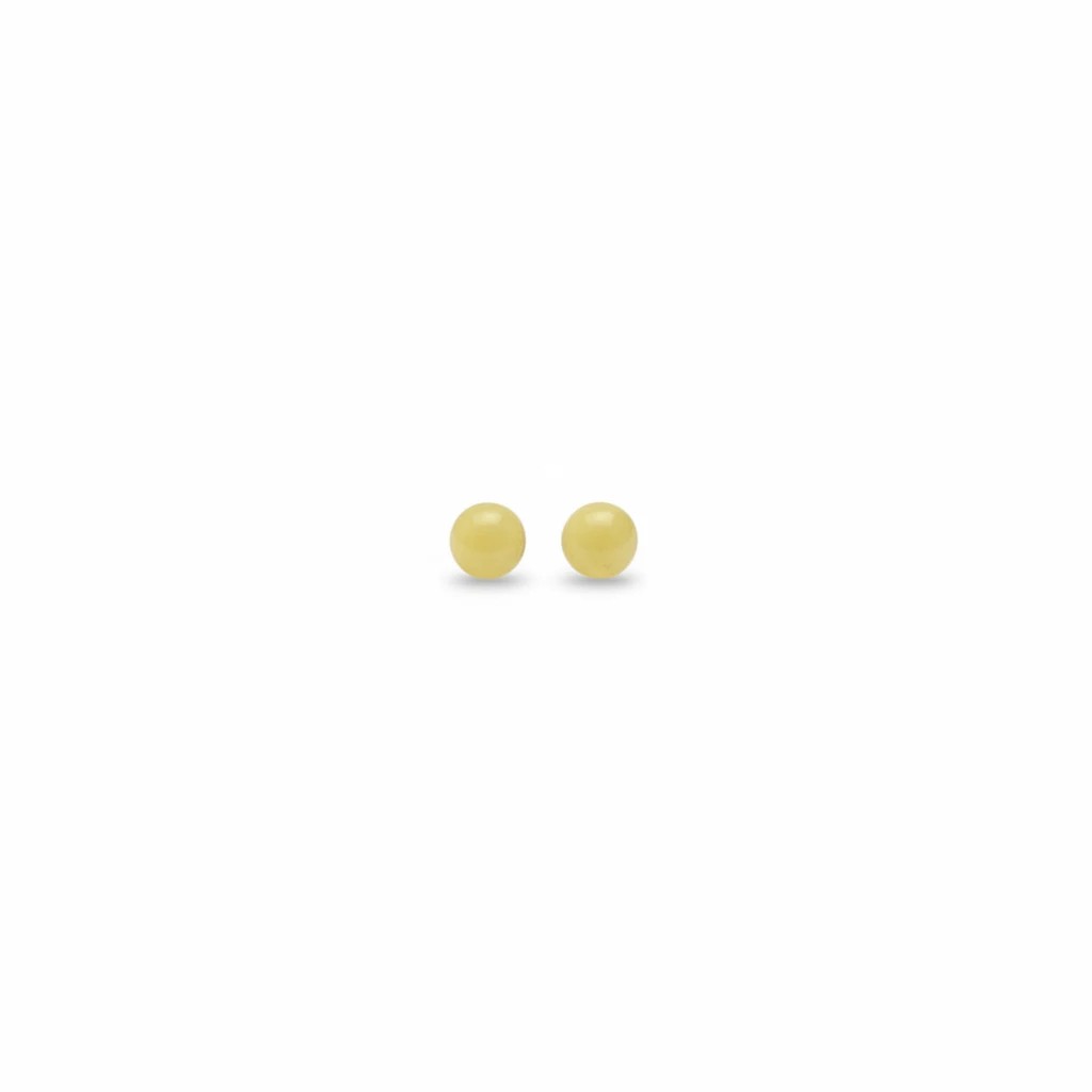 Wildflower Artisans round yellow opal stud earrings set in 14K gold with a warm honey glow.