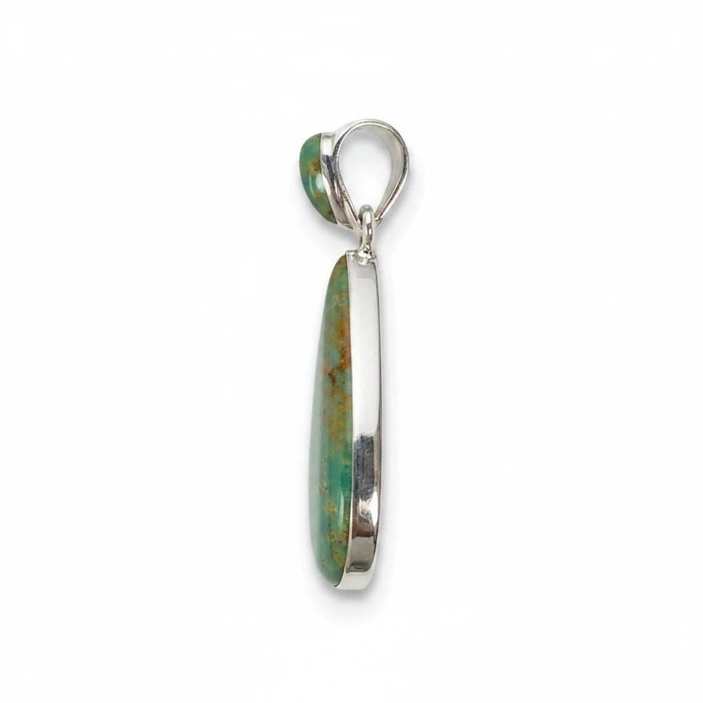 Wildflower Artisans Martinez Royston turquoise teardrop pendant in sterling silver, side view showing bezel setting