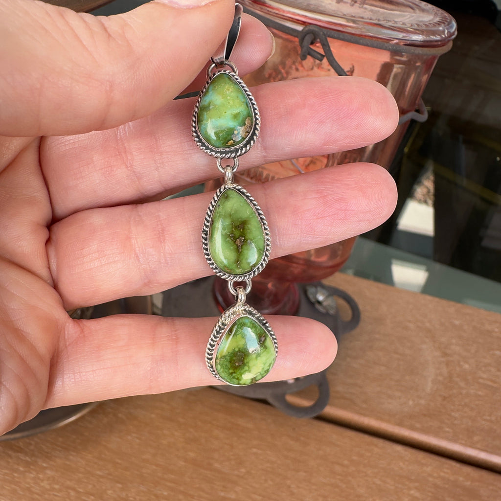 Wildflower Artisans C. Wylle sterling silver pendant featuring three graduated Sonoran Mountain turquoise teardrops.
