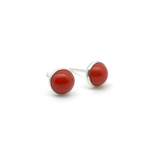 Wildflower Artisans round spiny oyster stud earrings featuring red-orange cabochons set in polished sterling silver.