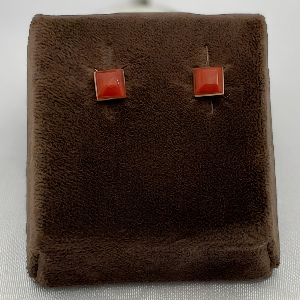 Wildflower Artisans square spiny oyster stud earrings with a domed red-orange cabochon set in a minimalist bezel.