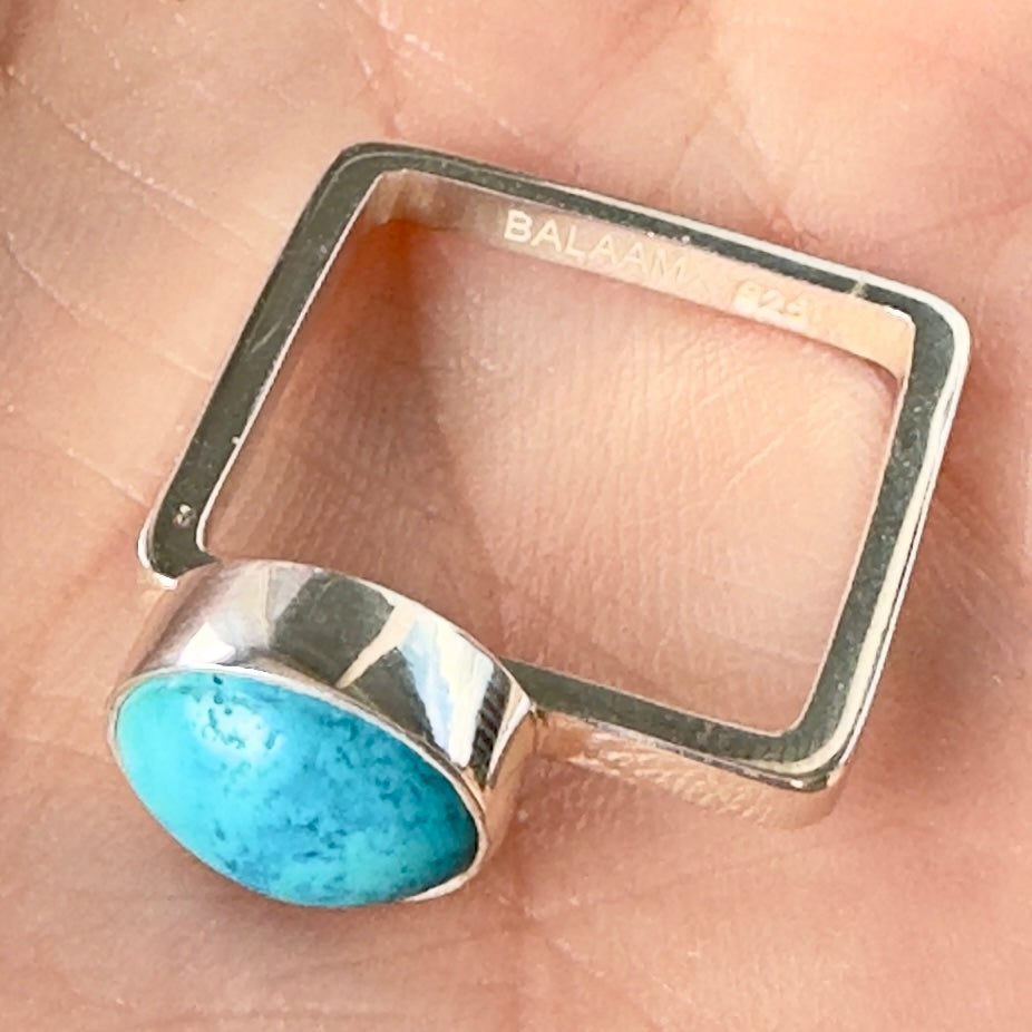 Wildflower Artisans BALAAM square sterling silver band ring featuring an oval sky blue turquoise cabochon stone.