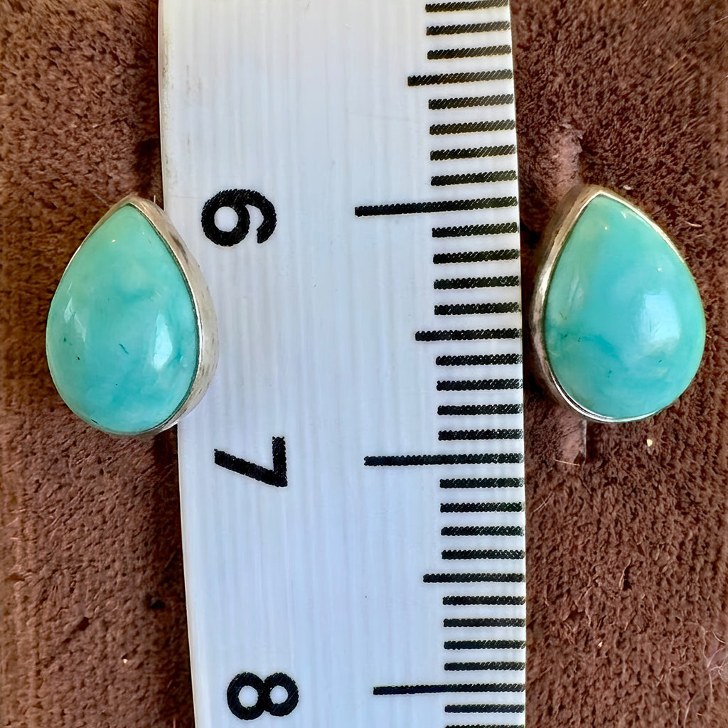 Wildflower Artisans teardrop turquoise stud earrings, approx. 10mm, set in sterling silver. One of a kind.