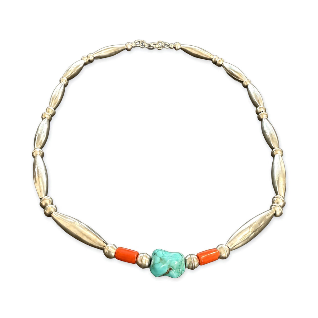 Vintage turquoise and coral sterling silver bead necklace on a white background