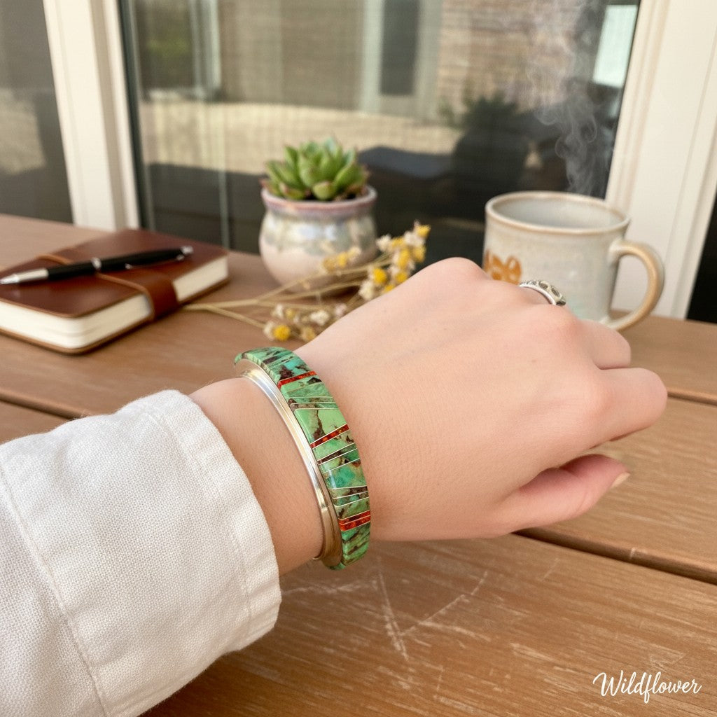 Wildflower Artisans sterling silver cuff featuring channel inlay of sage green Sonoran Mountain turquoise and red opal.