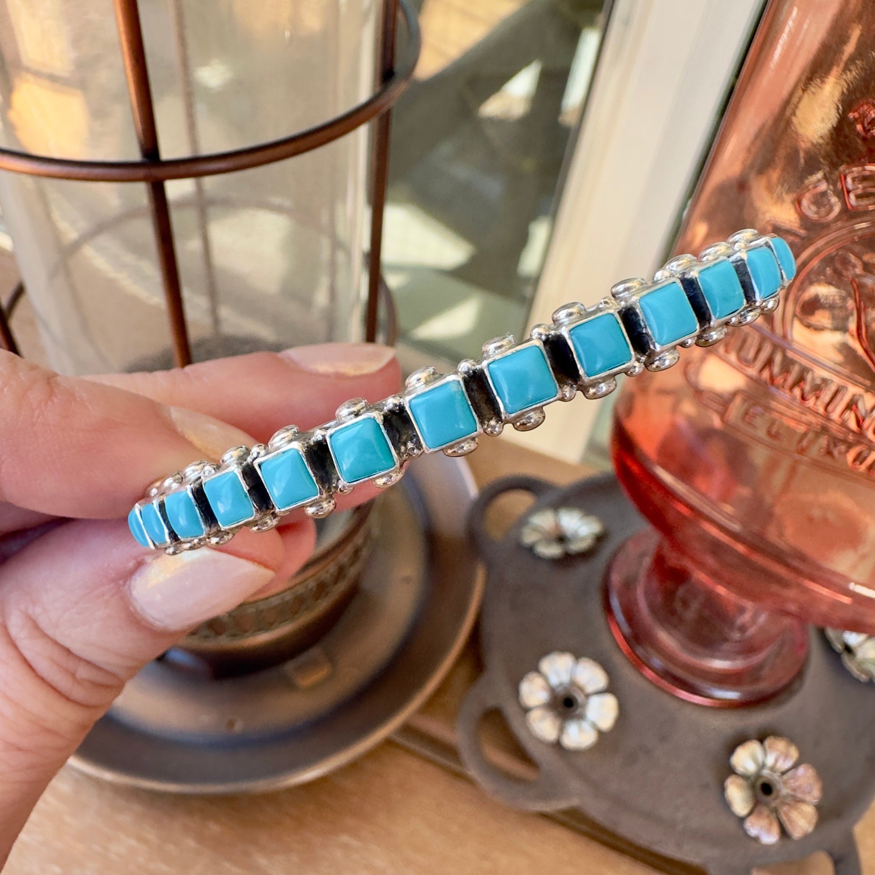 Wildflower Artisans sterling silver cuff bracelet featuring square robin egg blue Sleeping Beauty turquoise stones.
