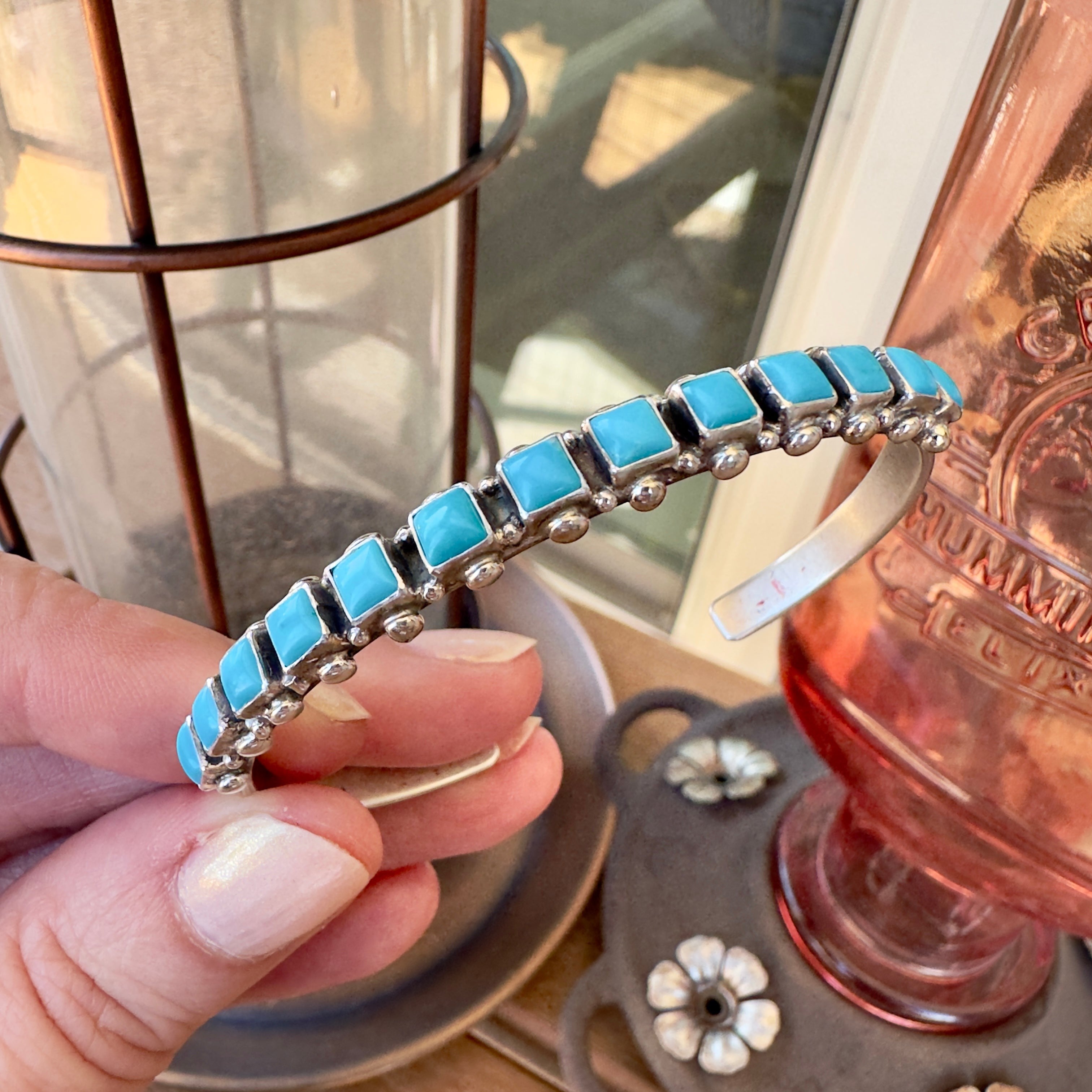 Wildflower Artisans sterling silver cuff bracelet featuring square-cut robin egg blue Sleeping Beauty turquoise stones.