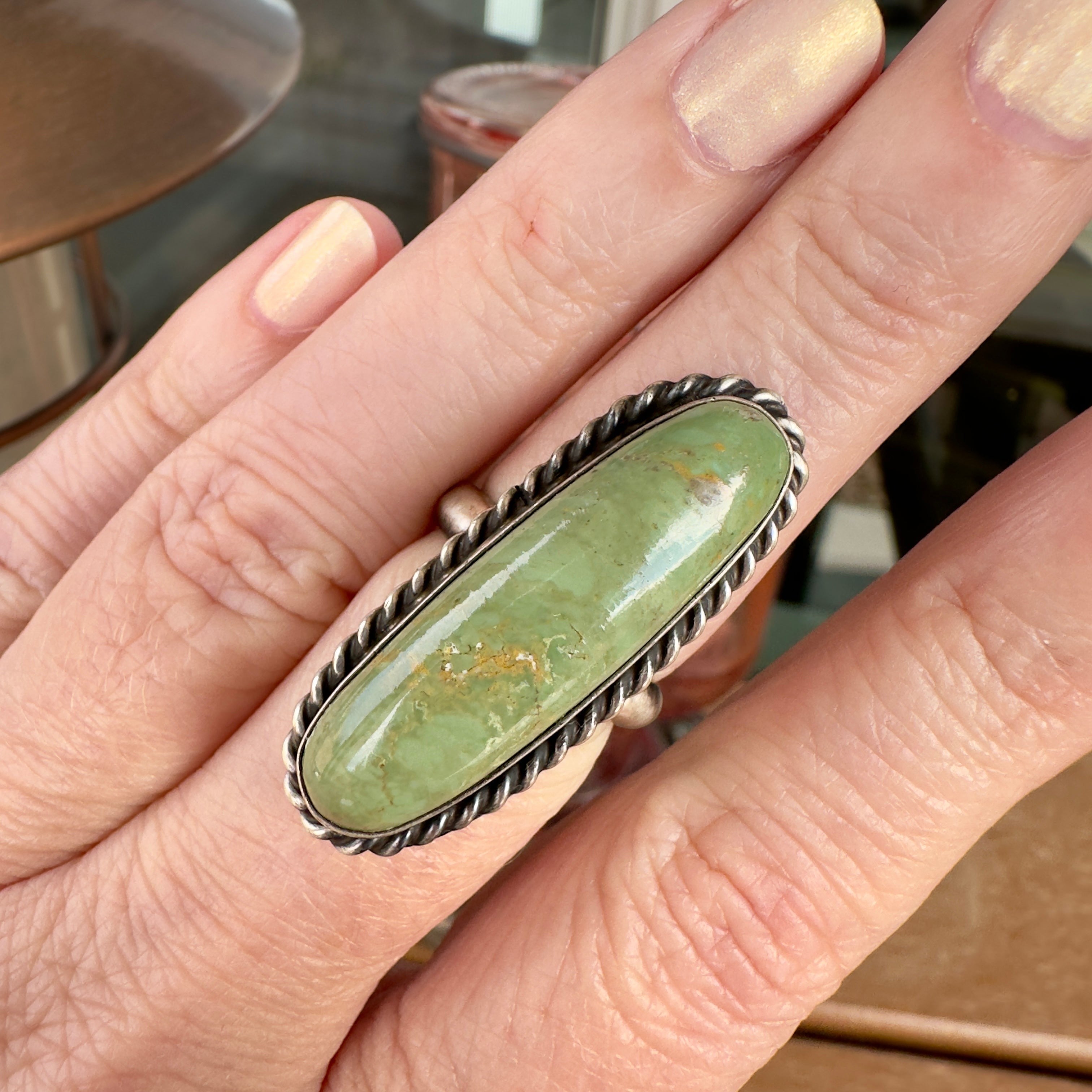 Wildflower Artisans long oval Sonoran Mountain turquoise ring in sterling silver with twisted rope bezel detail