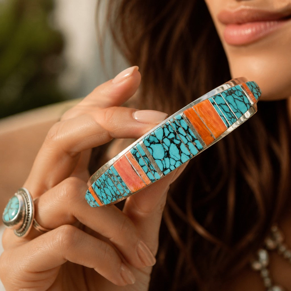 Wildflower Artisans sterling silver cuff bracelet featuring hand-inlaid turquoise with black matrix and spiny oyster.