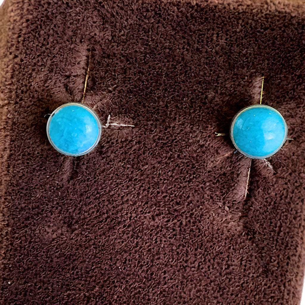 Wildflower Artisans small turquoise stud earrings in sterling silver setting. Genuine natural turquoise cabochons.