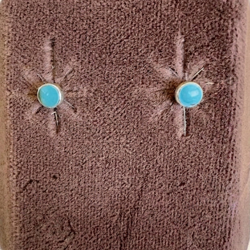 Wildflower Artisans small turquoise stud earrings in sterling silver setting. Genuine natural turquoise cabochons.