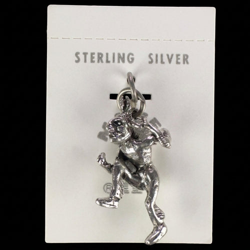 Wildflower Artisans vintage sterling silver dancer charm on original Maisel's trading post display card