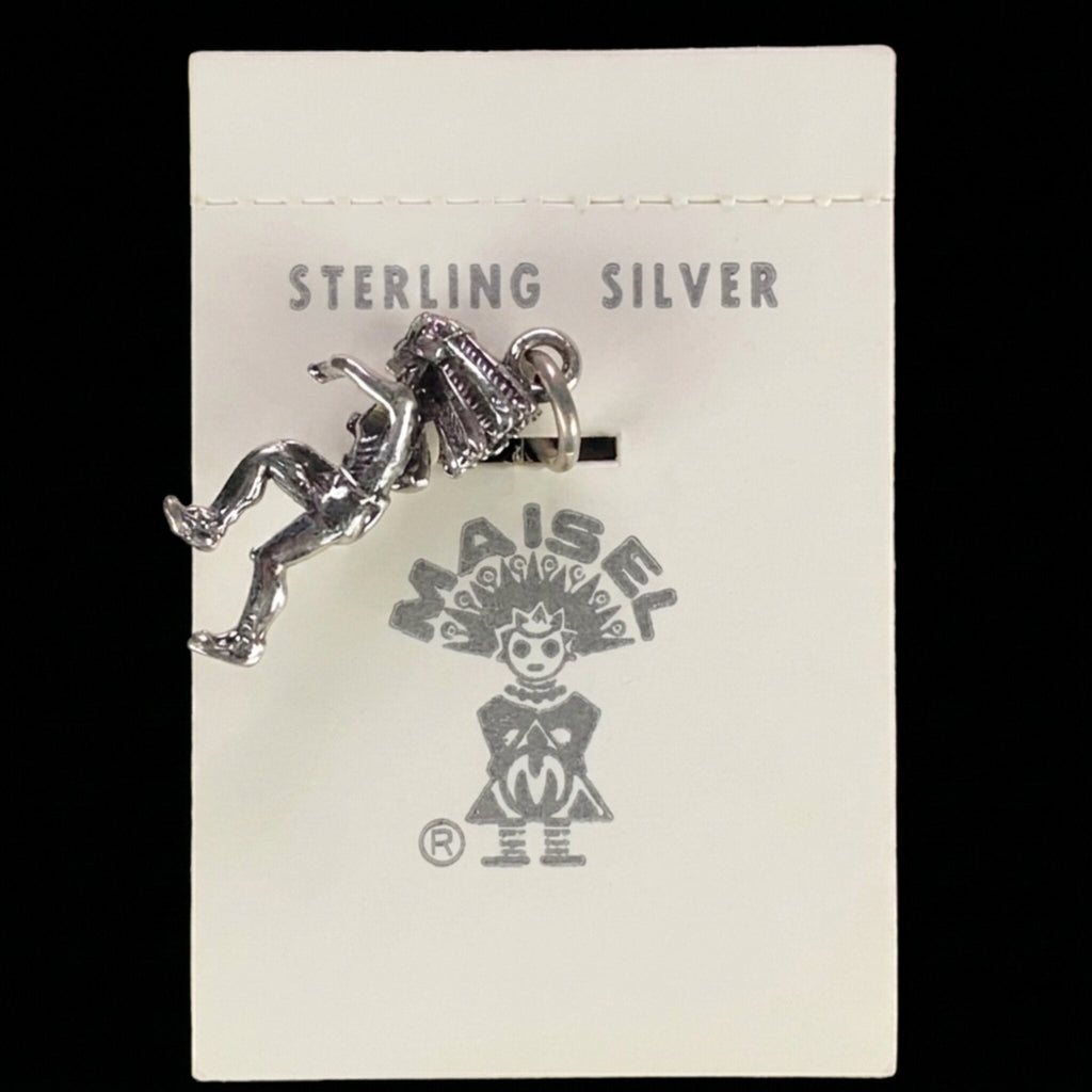 Wildflower Artisans vintage sterling silver dancer charm in a headdress on original Maisel's display card.