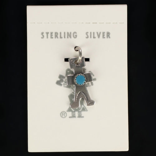 Wildflower Artisans vintage sterling silver figure charm with a turquoise cabochon on original Maisel's display card.