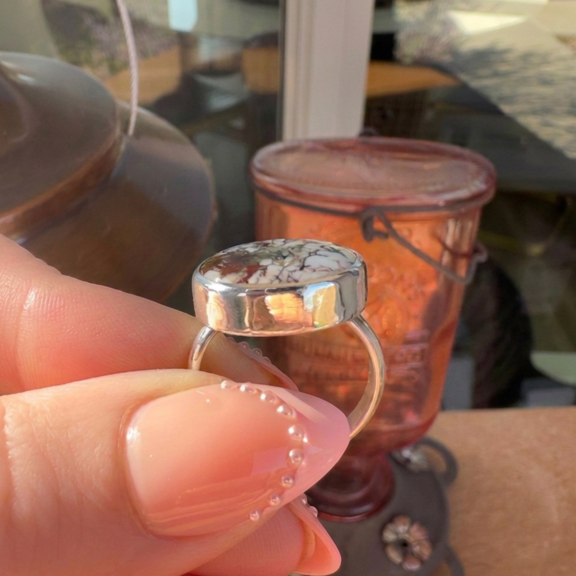 Wildflower Artisans sterling silver ring featuring a natural Wild Horse stone with rust and cream patterned cabochon.