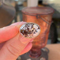 Wildflower Artisans sterling silver ring featuring a natural Wild Horse stone with rust and cream patterned cabochon.