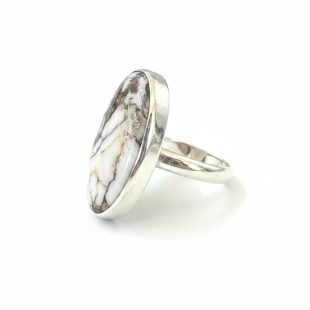 Wildflower Artisans sterling silver ring featuring an oval Wild Horse magnesite cabochon with cream and brown matrix.