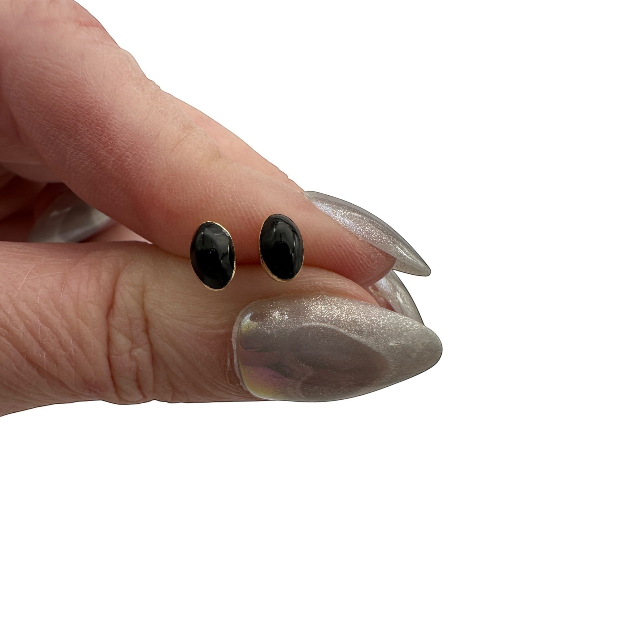 Wildflower oval black onyx stud earrings in 24K gold bezel, approximately 6x4mm.