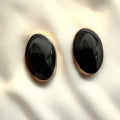 Wildflower black onyx oval stud earrings with 24K gold bezel, 6x4mm polished stones.