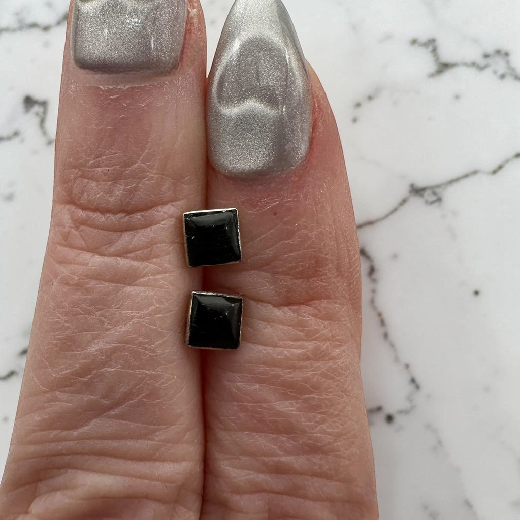 Wildflower black onyx square stud earrings in sterling silver. Modern, geometric design.