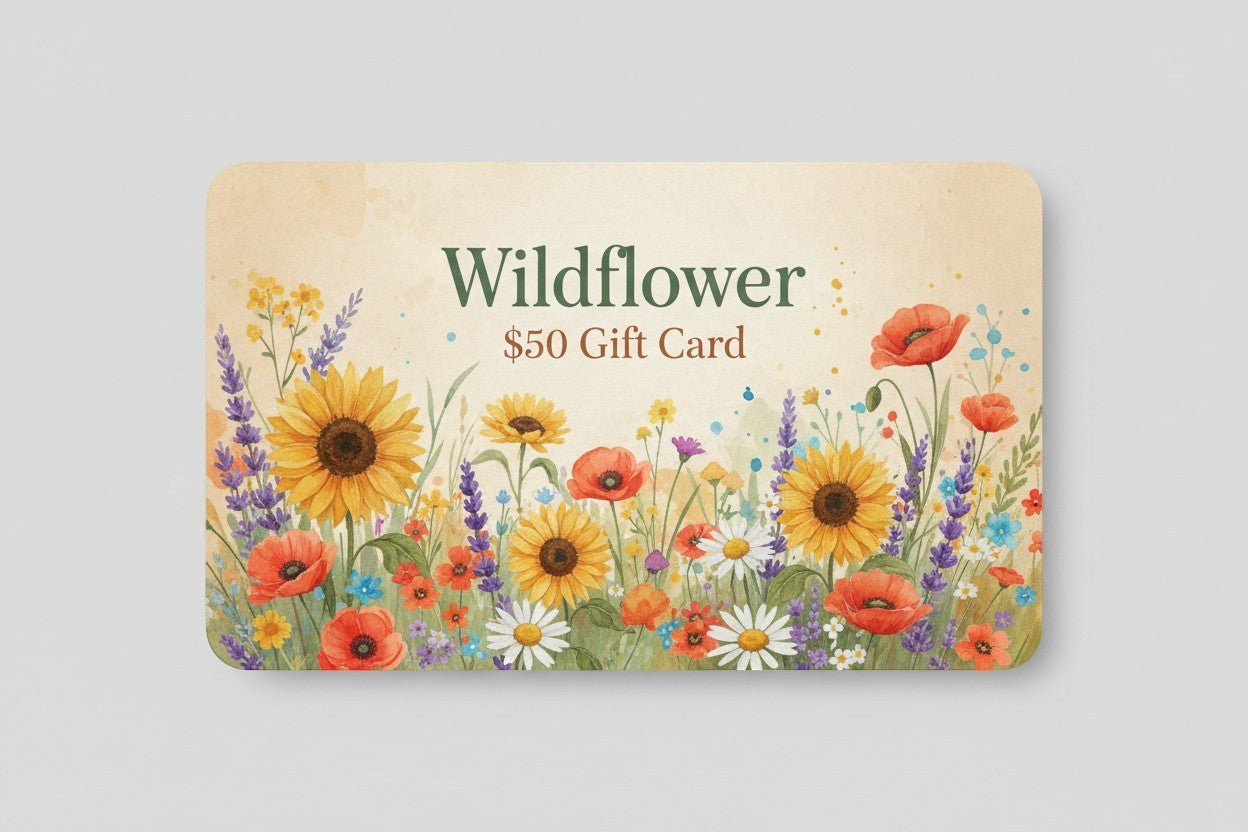 Wildflower $50 gift card with a watercolor floral design featuring sunflowers, poppies, lavender, and daisies.