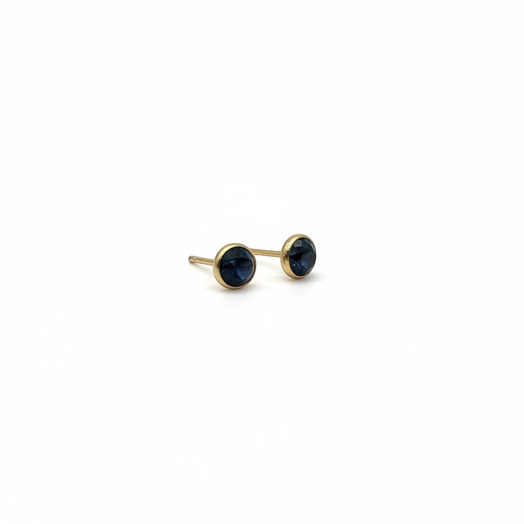 Wildflower 24K gold bezel oval stud earrings with polished blue stones, 6x4mm.