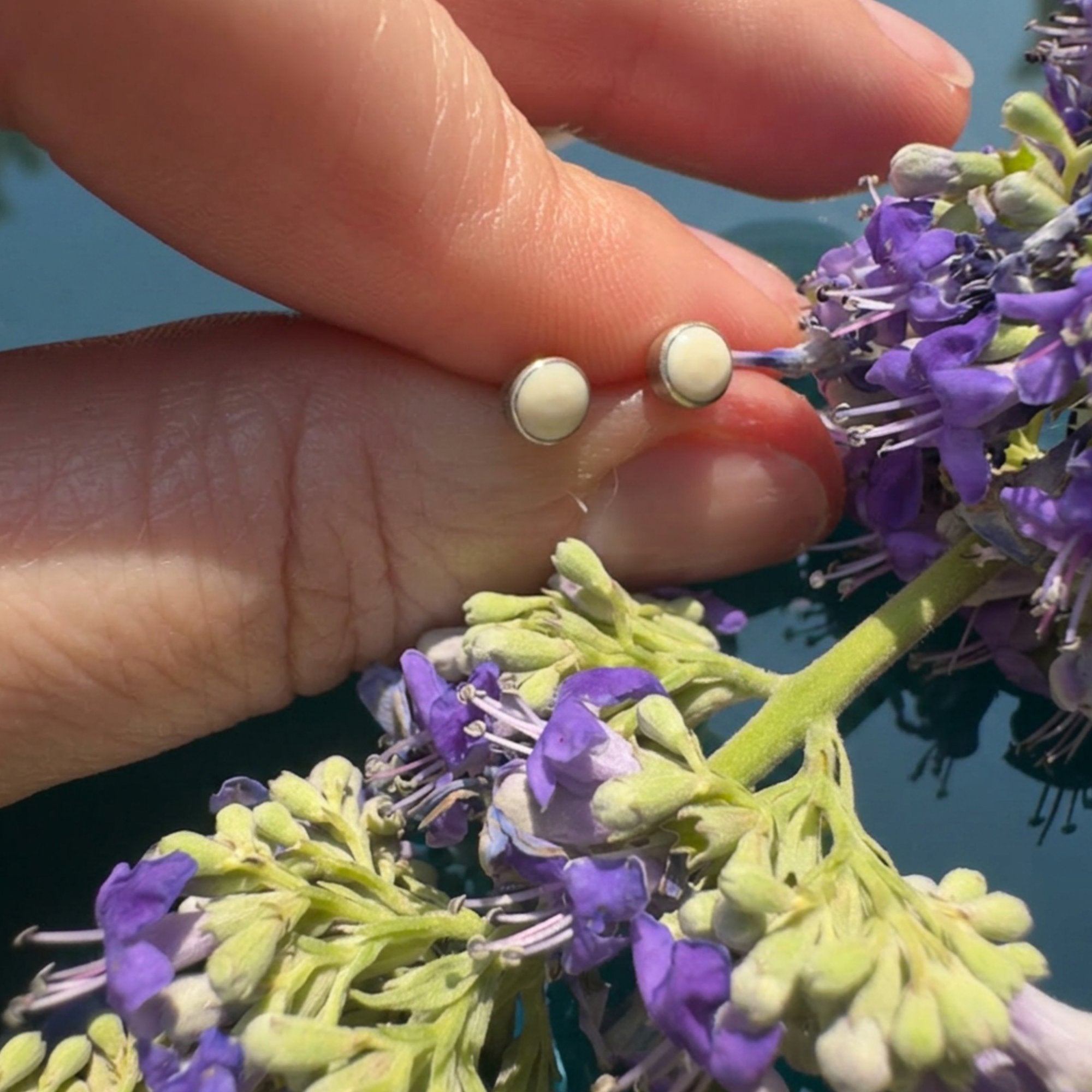 Yellow opal round stud earrings in 14K gold with rich honey color