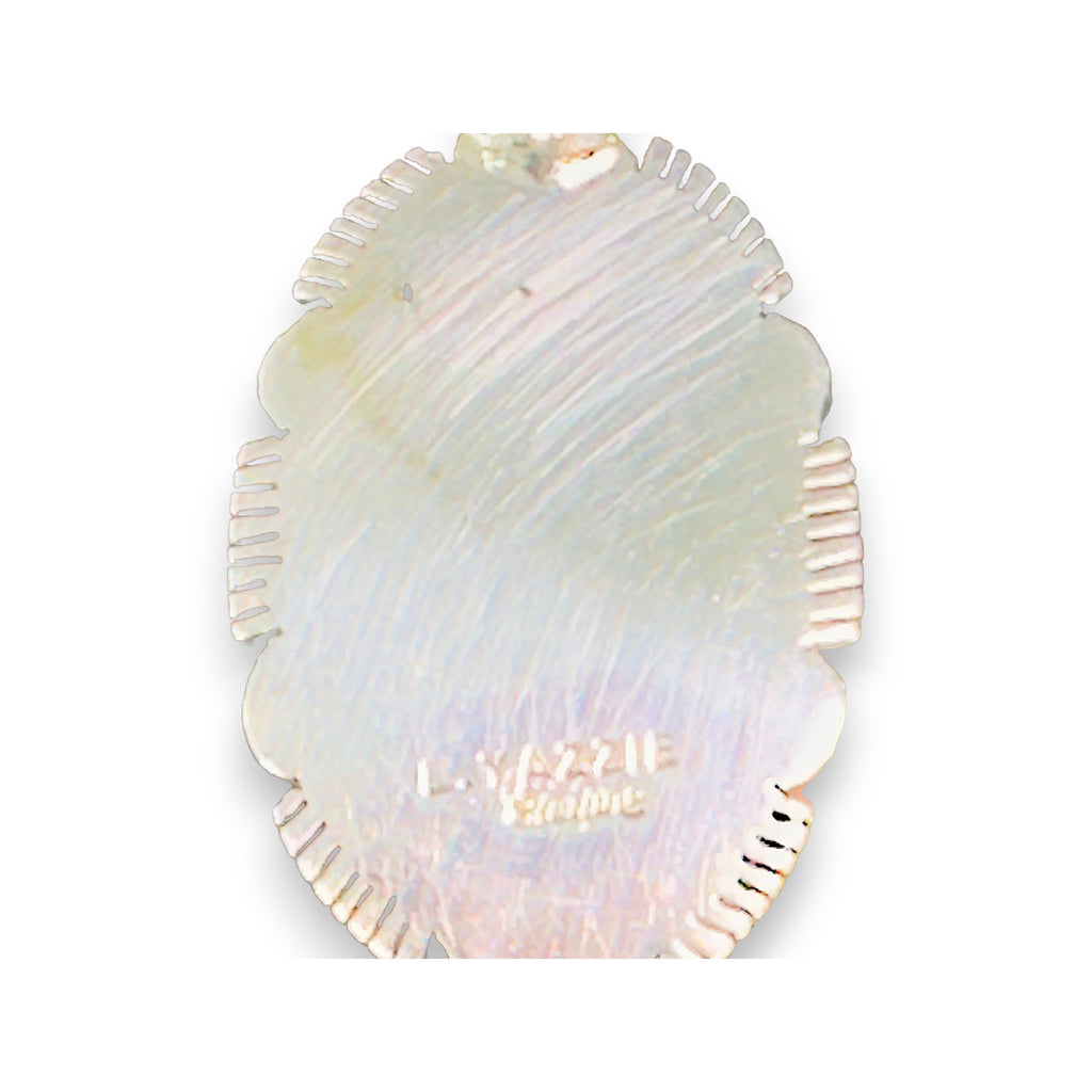 Winter Star, White Buffalo Pendant, Navajo Sterling, by Leslie Yazzie, side angle